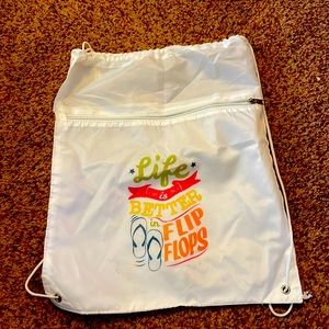 White nylon backpack